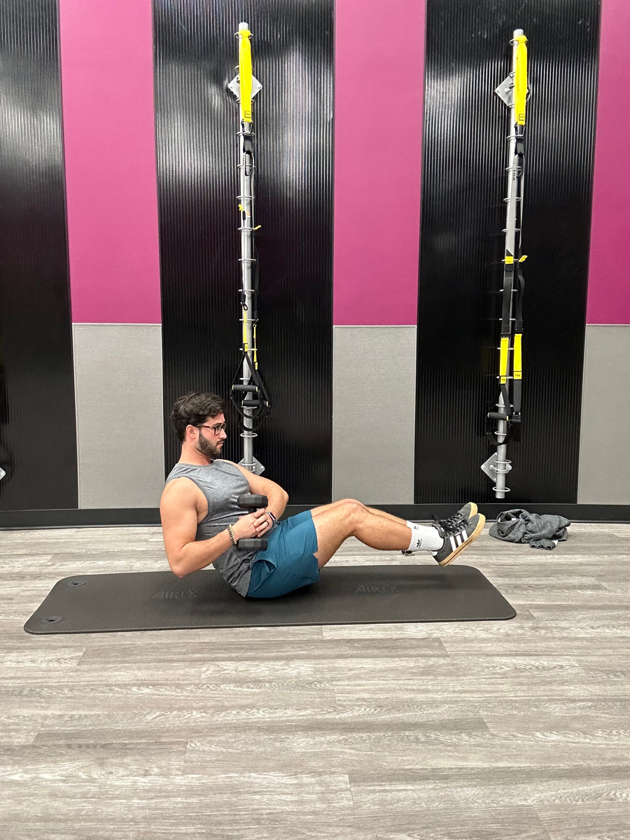 Standing oblique twist online with dumbbells